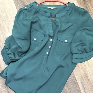 Blouse green size medium has been worn